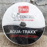 Капельная лента Aqua-TraXX / Аква-Трекс 1100 м, 10 см, 6 mil, 1,41 л/ч, щелевая (Toro)